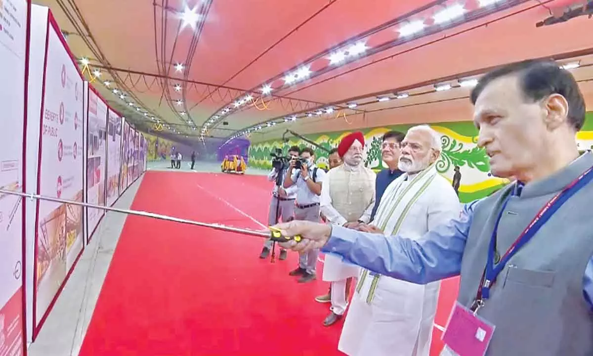 PM Modi with Union ministers Piyush Goyal and Hardeep Singh Puri, during a ceremony to dedicate to the nation the main tunnel and five underpasses of Pragati Maidan Integrated Transit Corridor Project, in New Delhi on Sunday