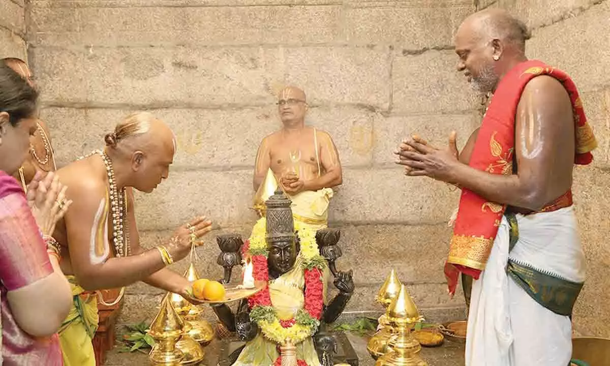 Priests performing Panchagavyadivasam ritual in the newly built Vakulamatha temple atop Peruru Hillock near Tirupati city, as part of Maha Samprokshanam ceremony on Sunday