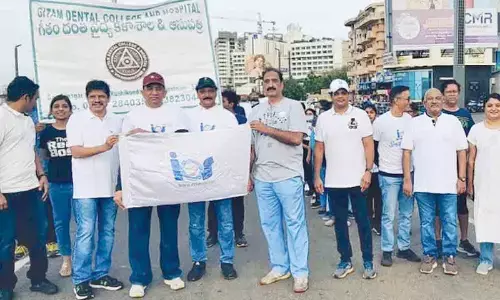 Participants at the smile rally organised at Beach Road in Visakhapatnam on Sunday