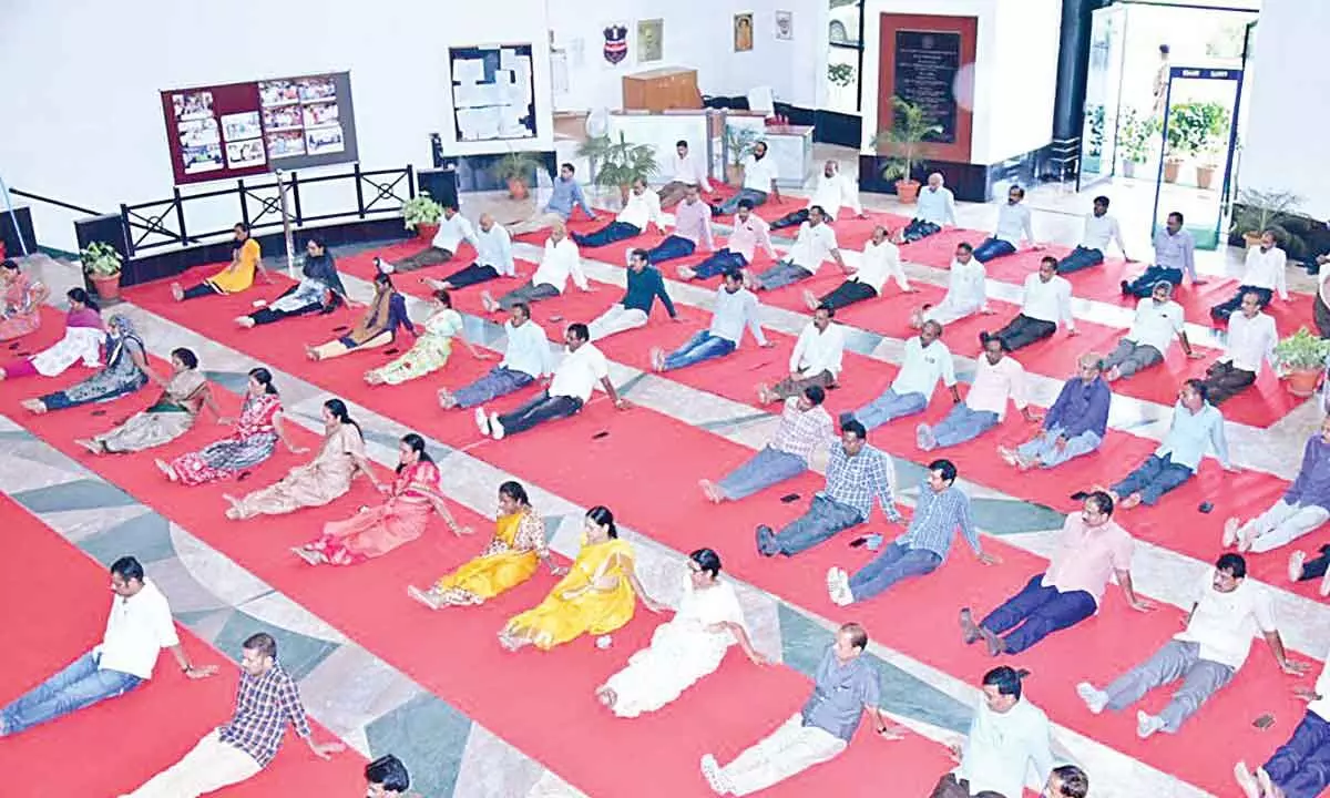TSRTC employees perform Yoga on the eve of Intl Day of Yoga