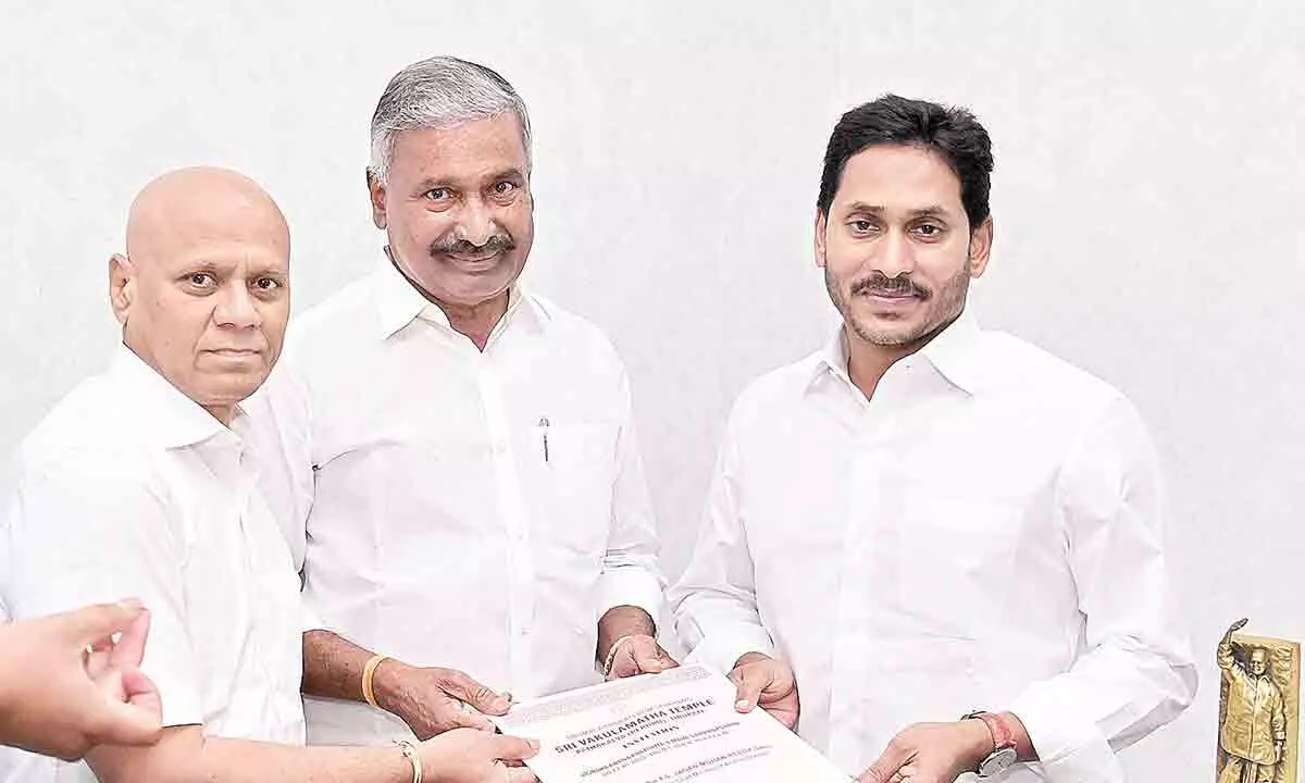 Minister for energy, forest and environment Peddireddi Ramachandra Reddy along with TTD executive officer AV Dharma Reddy invites Chief Minister Y S Jaganmohan Reddy to participate in Vakulamatha temple Mahasamprokshanam, at CM camp office on Monday