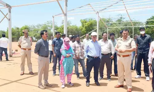 Tirupati Collector K Venkata Ramana Reddy and SP P Parameswar Reddy inspecting arrangements at Apache industry site on Monday