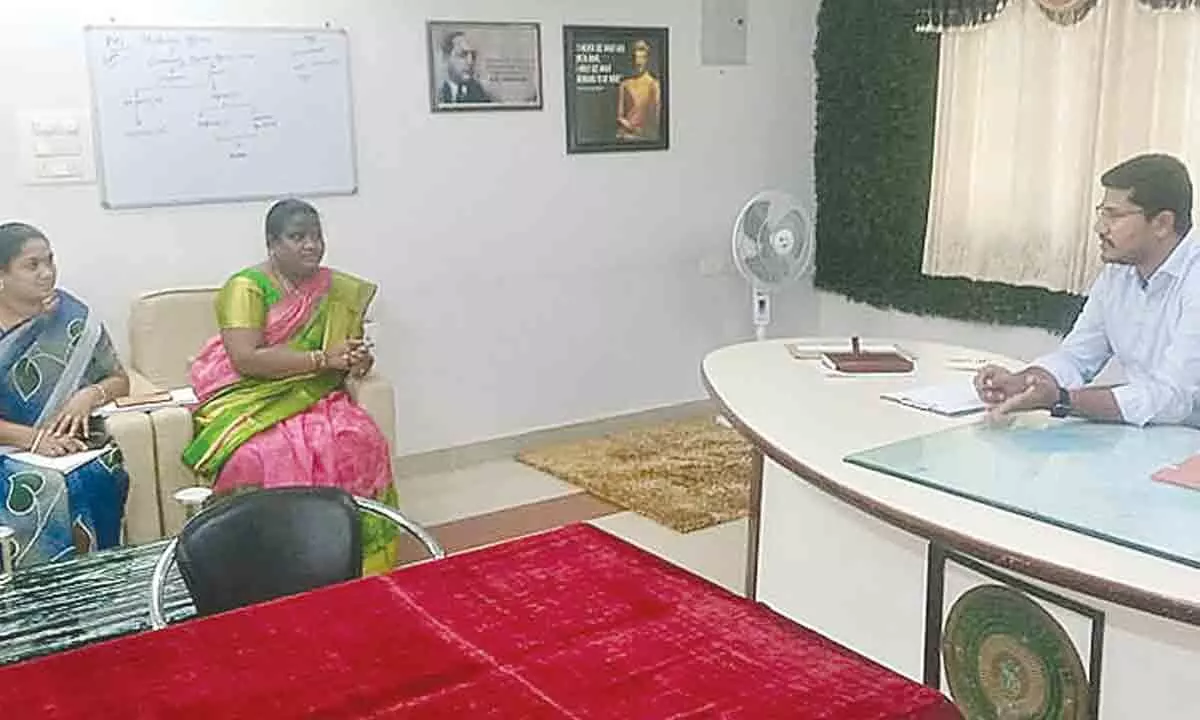 Araku MP G Madhavi and Rampachodavaram MLA N Dhanalakshmi discussing roads and other problems with Joint Collector and Rampachodavaram ITDA PO Suraj Ganore at his office in Rampachodavaram on Tuesday