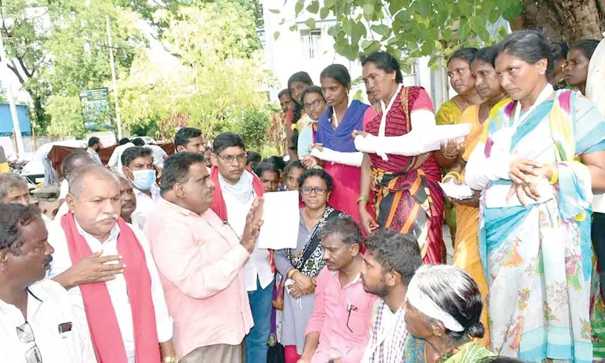 CPI national council member Takkalapally Srinivas Rao speaking to the poor women who sustained injuries in the attack at Gundla Singaram on Tuesday