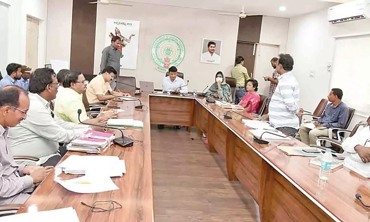 Annamayya District Collector PS Girisha holding a review meeting with officials in Rayachoti on Tuesday