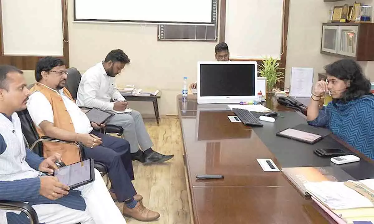 GMC Commissioner Keerthi Chekuri addressing a meeting with AP Urban Infrastructure Asset Management Ltd officials in Guntur on Tuesday