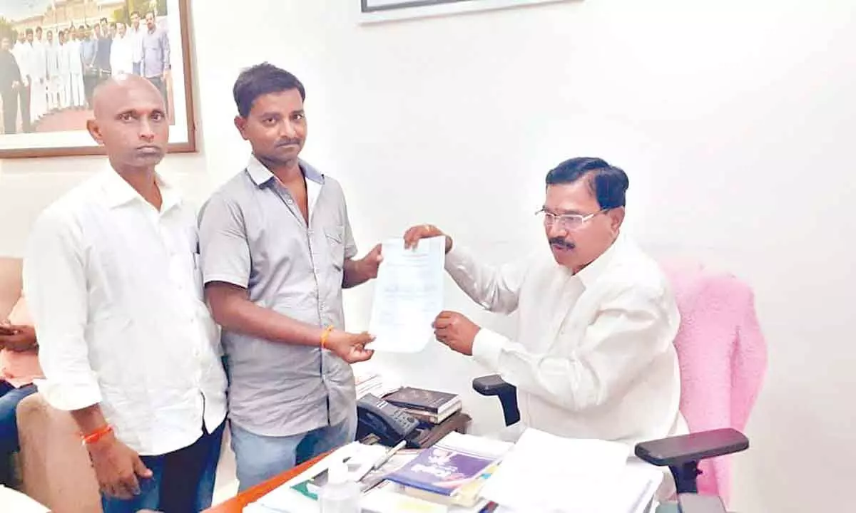 Agriculture Minister Singireddy Niranjan Reddy, handing over a CMRF cheque to a benificiaryfrom Pebbar mandal in Wanaparthy district on Wednesday