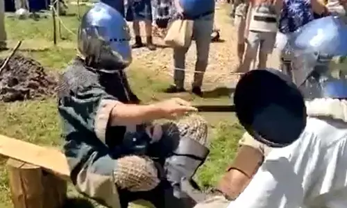 Watch The Trending Video Of Pan-Slapping Contest Between Two Men