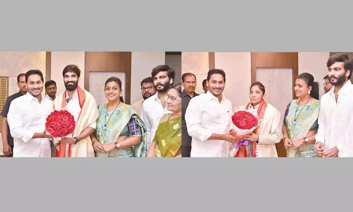 Chief Minister Y S Jagan Mohan Reddy congratulates ace badminton player Kidambi Srikanth and Deaflympian tennis player Sheikh Jafrin at the Secretariat on Friday