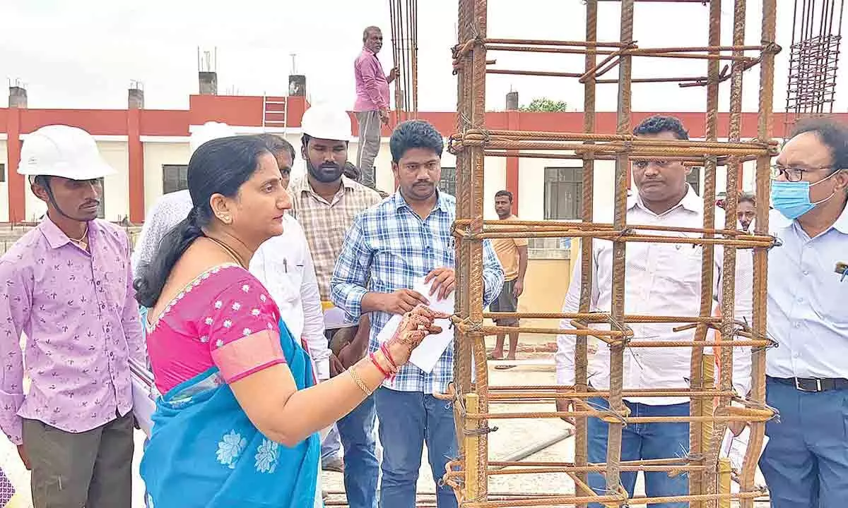 District Collector K Madhavi Latha inspecting the construction works of the Teaching Medical College in Rajamahendravaram on Friday