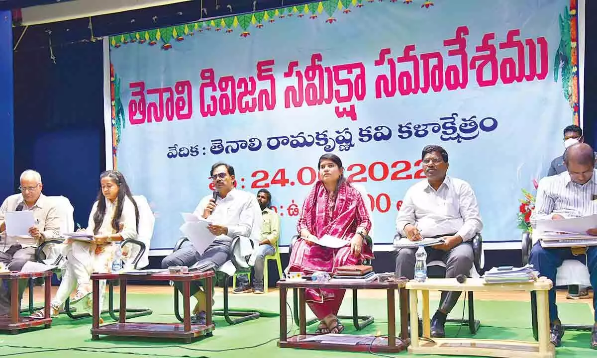 District Collector M Venugopala Reddy addressing Tenali division level review meeting at Rama Krishna Kavi Kalakshetram in Tenali on Friday. Joint Collector G Rajakumari and District Revenue Officer K Chandrasekhara Rao are also seen.