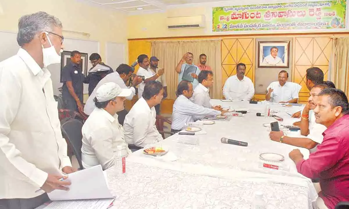 Ongole MP Magunta Srinivasulu Reddy conducting a review meeting with the officials of railways, R&B and Municipal Corporation at his camp office in Ongole on Frida
