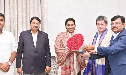 ATC Tyres director Toshio Fujiwara along with company officials invites Chief Minister Y S Jagan Mohan Reddy for the inauguration of their plant, at his camp office in Tadepalli on Friday