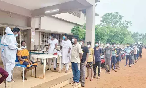 DMHO department officials conducting Covid-19 test to NCC cadets at SKR High School in Kakinada on Friday