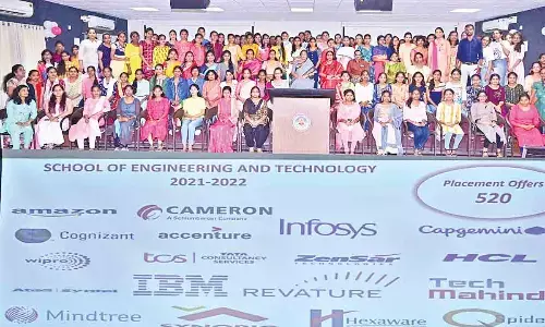 SPMVV V-C Prof D Jamuna, Registrar Prof DM Mamatha and other faculty with the students who got placements, in Tirupati on Friday.