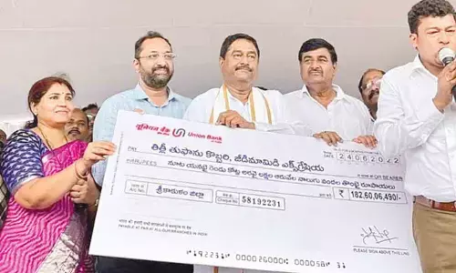 APLA Speaker, T Sitaram, ministers, D Prasada Rao, S Appala Raju, ZP chairperson, P Vijaya Sai Raj, MLC, D Srinivas displaying dummy cheque in Srikakulam on Friday