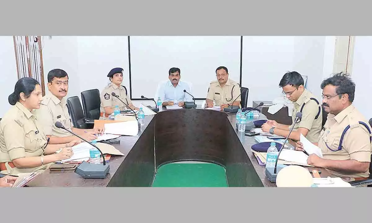 SEB Director Avula Ramesh Reddy holds review meet with police and SEB officials on prevention of ID liquor and ganja, at Police Guest House in Tirupati on Saturday