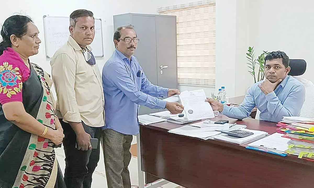 Guards, voluntary organisation, director Varada Nageswara Rao submitting a petition to Joint Collector Ch Sridhar at the district Collectorate in Rajamahendravaram on Monday