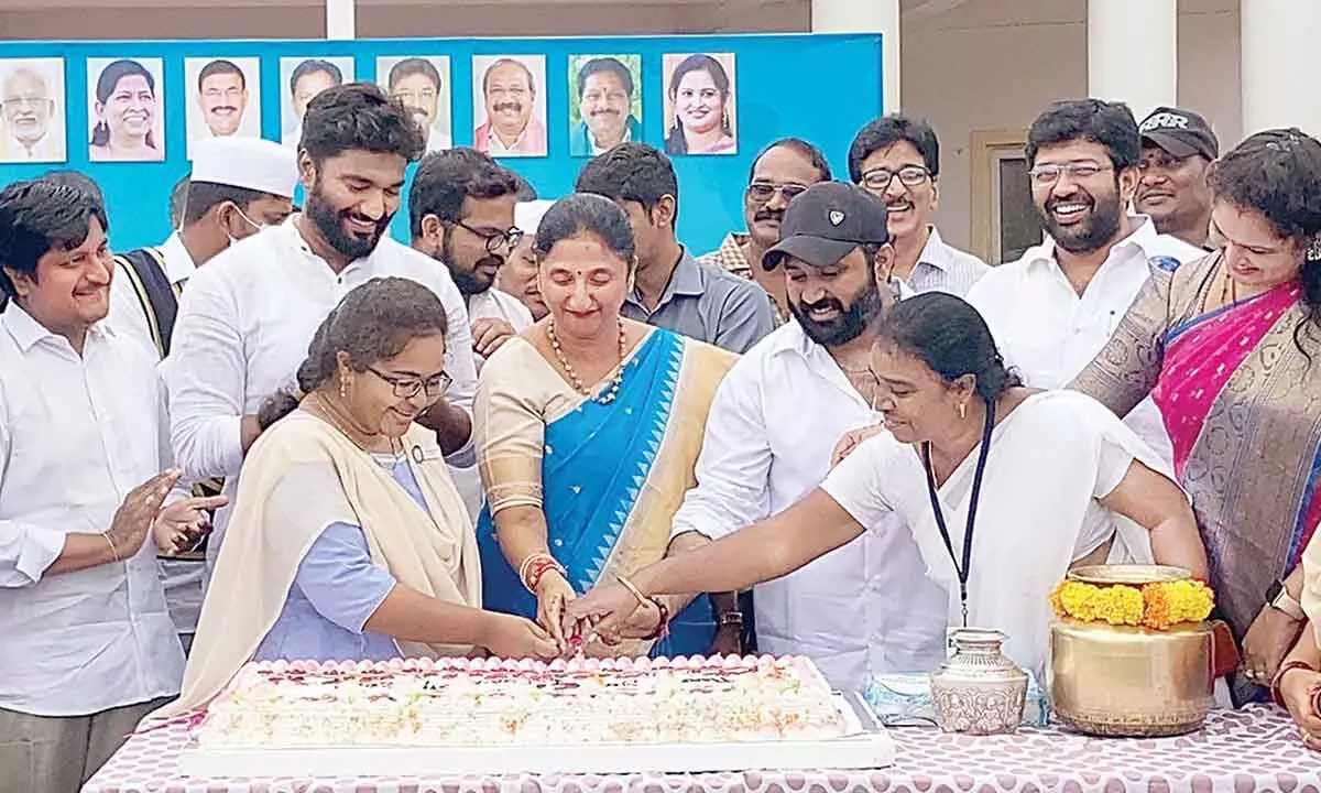 District Collector Madhavi Latha cutting a cake at the Collectorate here on Monday, to celebrate regularisation of secretariat staff. MP Bharat Ram, MLA Jakkampudi Raja and YSRCP rural constituency coordinator Chandana Nageswar are also seen.