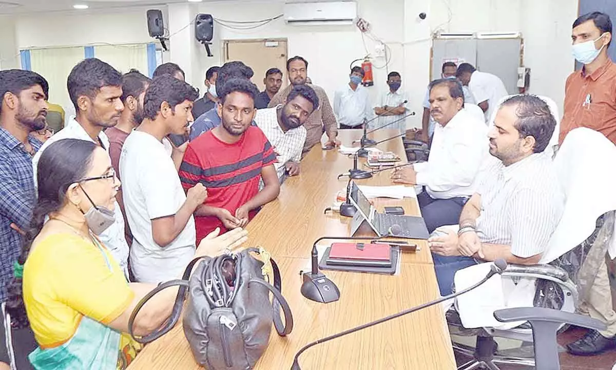 District Collector Rahul Sharma receiving petitions from people during the Prajavani programme in Nalgonda on Monday