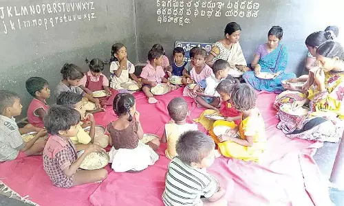 File photo of pregnant and lactating women having meal at an Anganwadi centre in Kanigiri