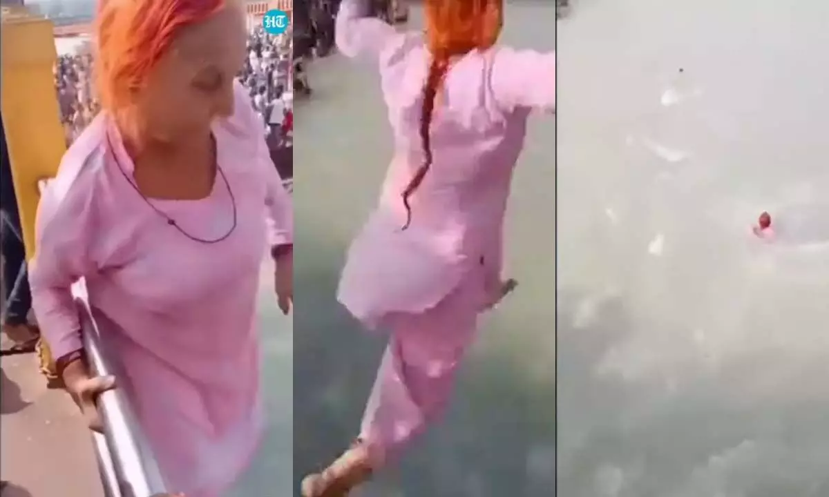 Watch The Trending video Of An Elderly Woman Performing Stunt In Ganga River
