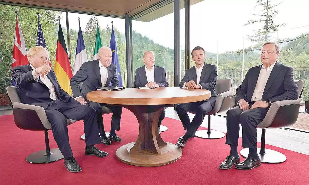 G7 leaders from left, British PM Boris Johnson, US President Joe Biden, German Chancellor Olaf Scholz, French President Emmanuel Macron and Italy PM Mario Draghi meet on the sidelines of G7 summit in Elmau, Germany on Tuesday