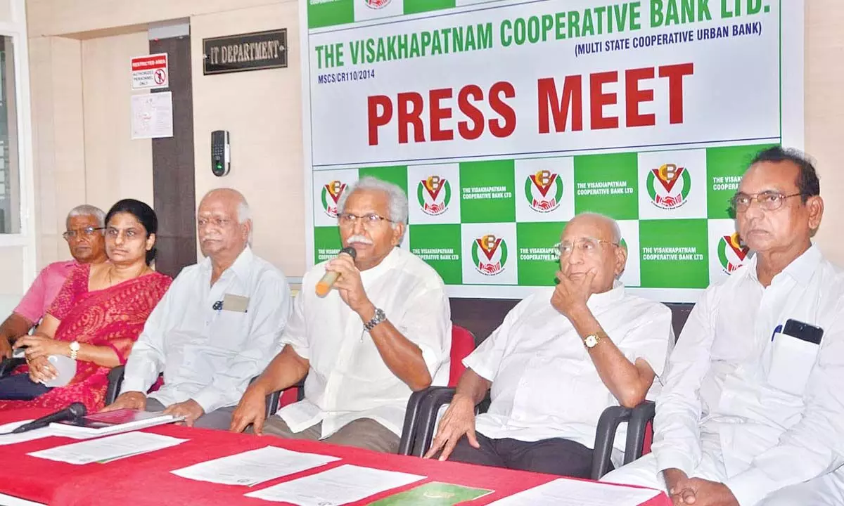 Chairman of the Visakhapatnam Cooperative Bank Ltd Chalasani Raghavendra Rao speaking at a press conference in Visakhapatnam on Tuesday