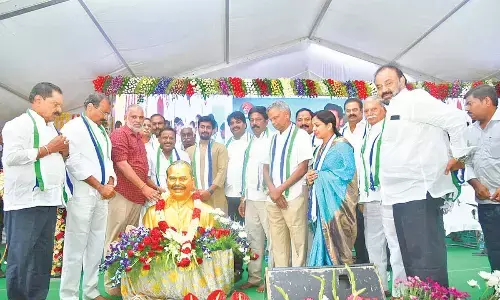 YSRCP leaders garlanding the bust of YS Rajasekhar Reddy before start of the plenary meeting in Tirupati