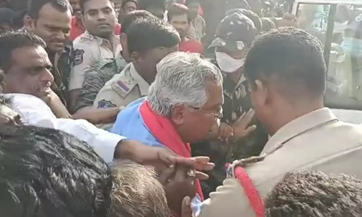 Police taking CPI national secretary and Rajya Sabha member Binoy Viswam and State secretariat member Takkalapally Srinivas Rao into custody during a rally near KU Cross Roads in Hanumakonda on Wednesday