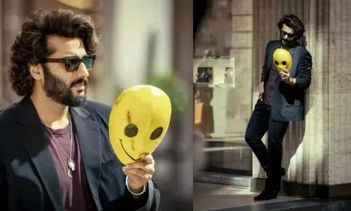 Arjun Kapoor promotes the movie in Paris holding the yellow mask!