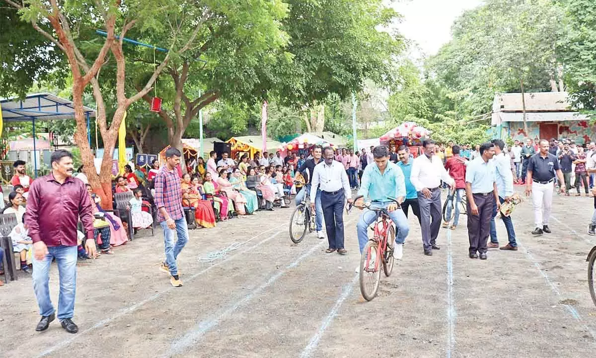 Staff and family members enthusiastically participating in the competitions organised at the Mela at 42 Battalion headquarters in Rajahmundry on Thursday