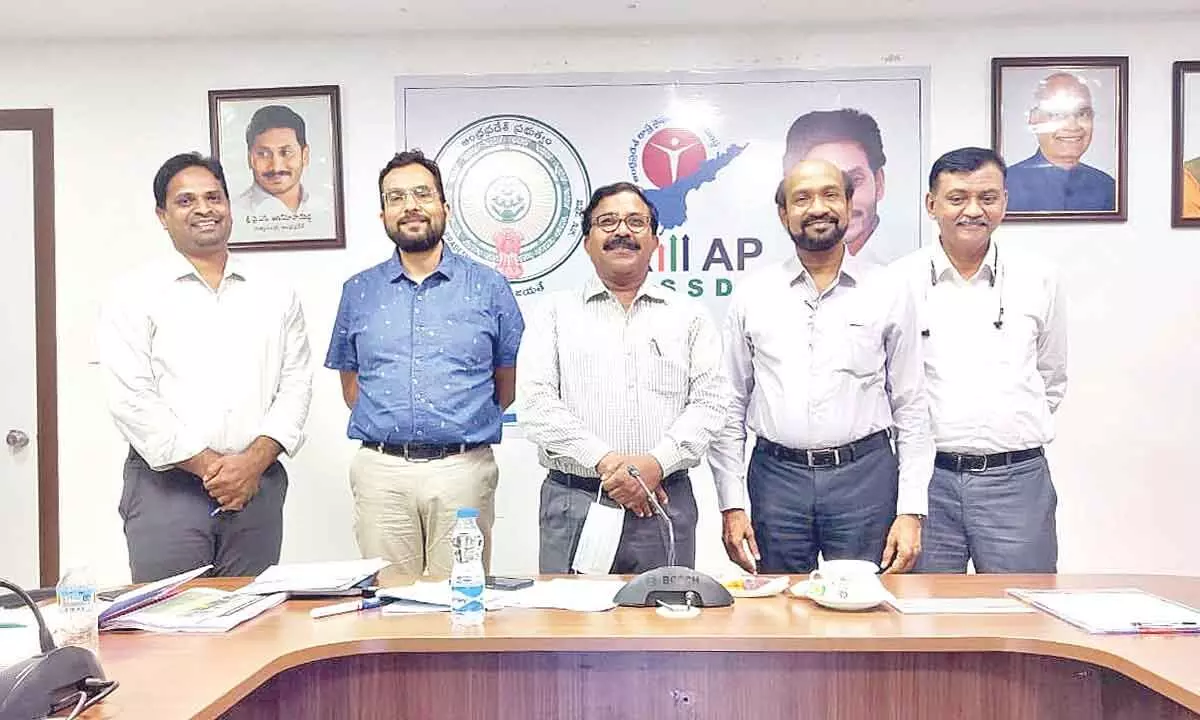 Daikin India representatives Gopinath, Mayank Agarwal, NVV Nagaraj and IV Patnaik with APSSDC MD and CEO Satyanarayana at his office in Tadepalli on Thursday