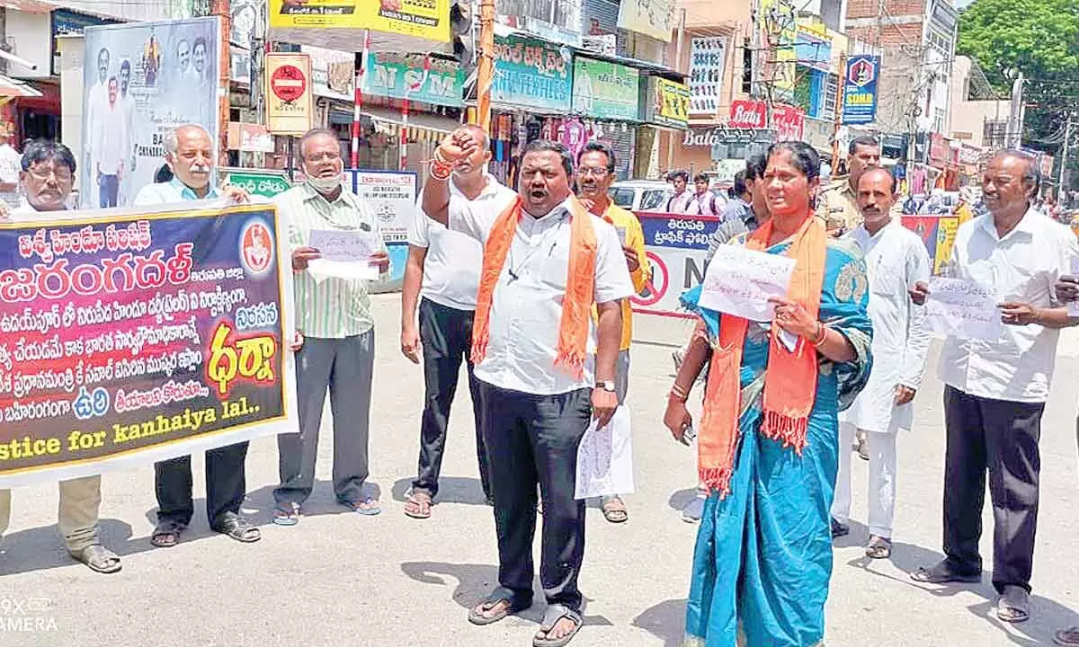 VHP and Bajrang Dal activists raising slogans against terrorists at Nalugu Kaalla Mandapam in Tirupati on Thursday.