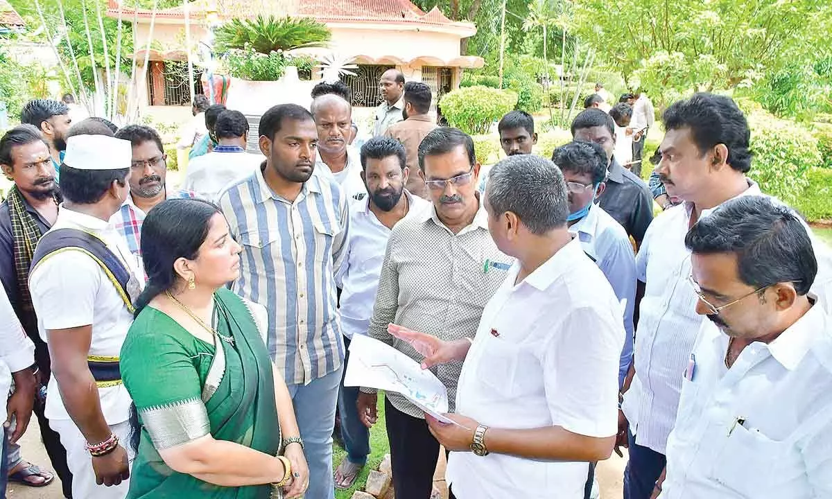 Vijayawada West Assembly Constituency MLA Velampalli Srinivas and Mayor R Bhagyalakshmi discussing with the officials on the development of KL Rao park in Vijayawada on Thursday