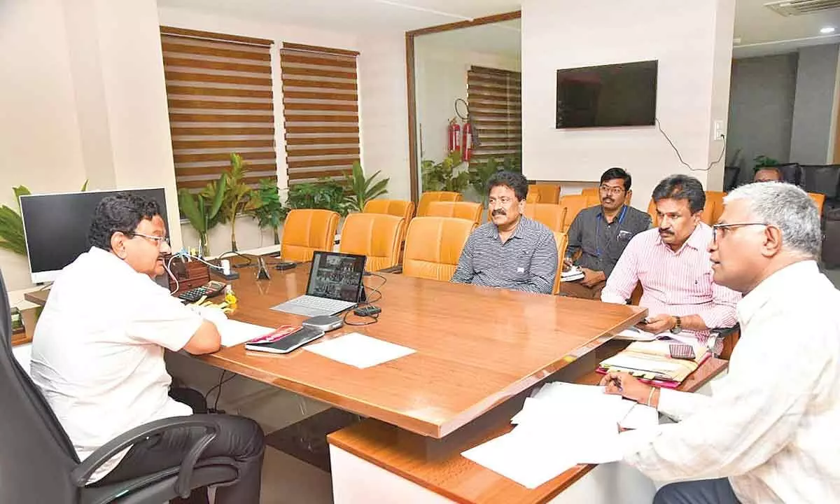 District Collector K Venkataramana Reddy participates in the video conference held by PR&RD Principal Secretary Gopal Krishna Dwivedi in Tirupati on Thursday. District Officials of Panchayat Raj, Water Management Agency and Rural Development are also seen.