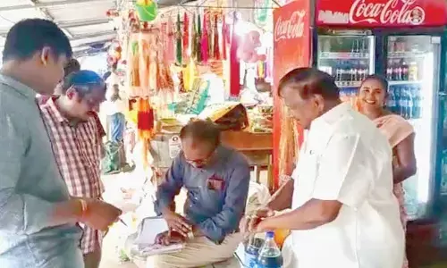 Vigilance and Enforcement and Legal Metrology officials conducting raids in Visakhapatnam on Thursday