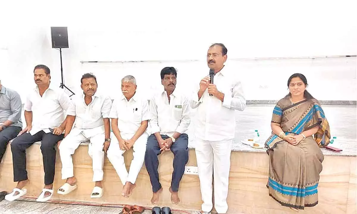 MLA Bhumana Karunakar Reddy addressing party leaders, corporators and activists at a function hall in Tirupati on Saturday.