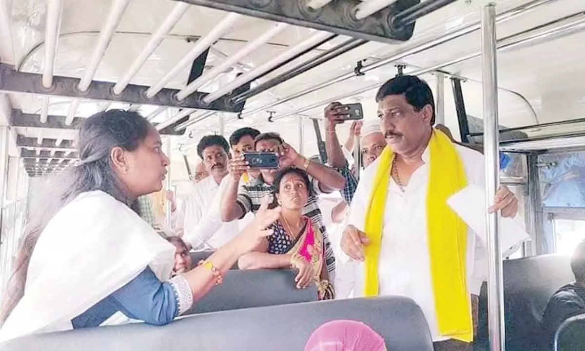 TDP former MLA B C Janardhan Reddy speaking to passengers in an RTC bus in Banaganapalle.