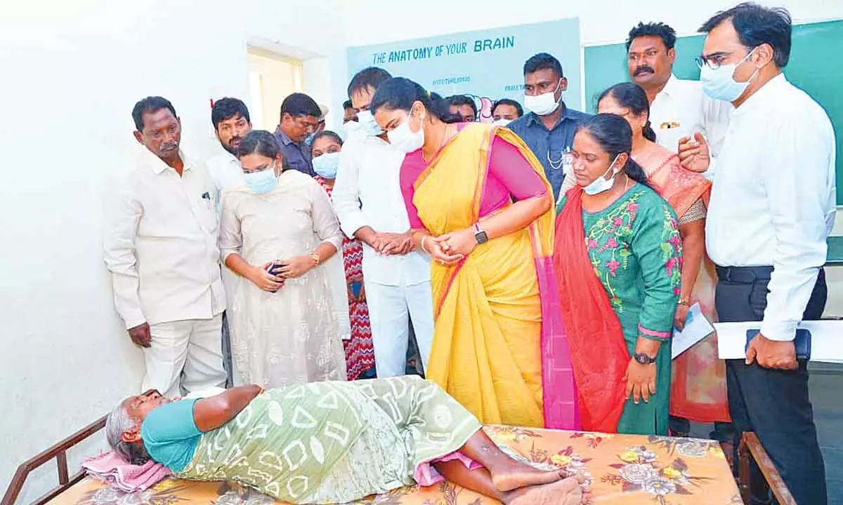 Minister for Medical and Health Vidadala Rajini interacts with a patient undergoing treatment at the PHC at Kolakaluru village in Guntur district on Saturday. Commissioner of Family Welfare J Nivas and District Collector  M Venugopala Reddy are also seen.