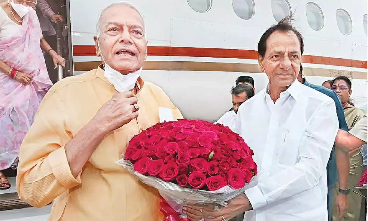 Chief Minister K Chandrashekar Rao receives Presidential candidate Yashwant Sinha at Begumpet Airport, in Hyderabad on Saturday