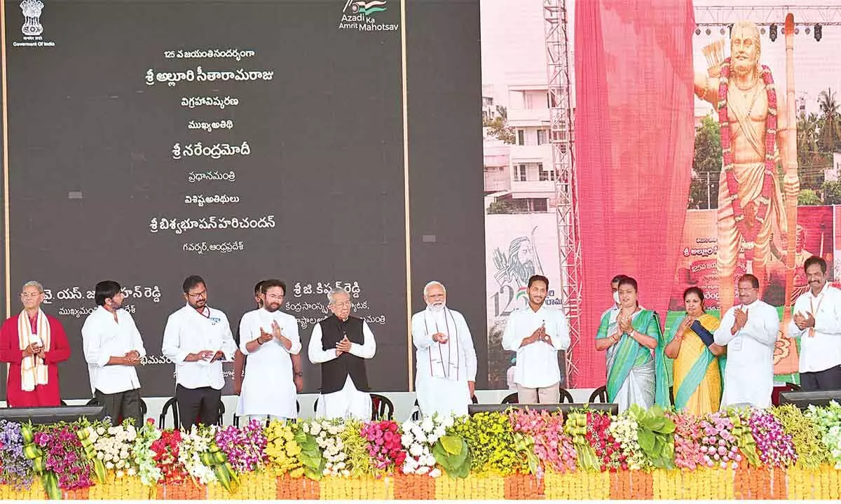 Prime Minister Narendra Modi with Union Minister G Kishan Reddy, Andhra Pradesh Governor Biswabhusan Harichandan, AP Chief Minister YS Jagan Mohan Reddy and other dignitaries, during the celebrations of the 125th birth anniversary of freedom fighter Alluri Sitarama Raju, in Bhimavaram on Monday