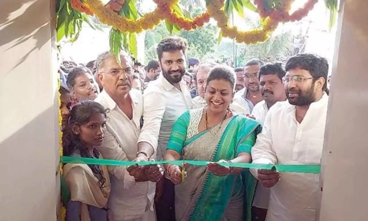 Tourism Minister RK Roja inaugurating Grama Sachivalaya building at Jagaadhapuram village on Monday. MLA Jakkampudi Raja and MP Margani Bharat Ram are also seen.