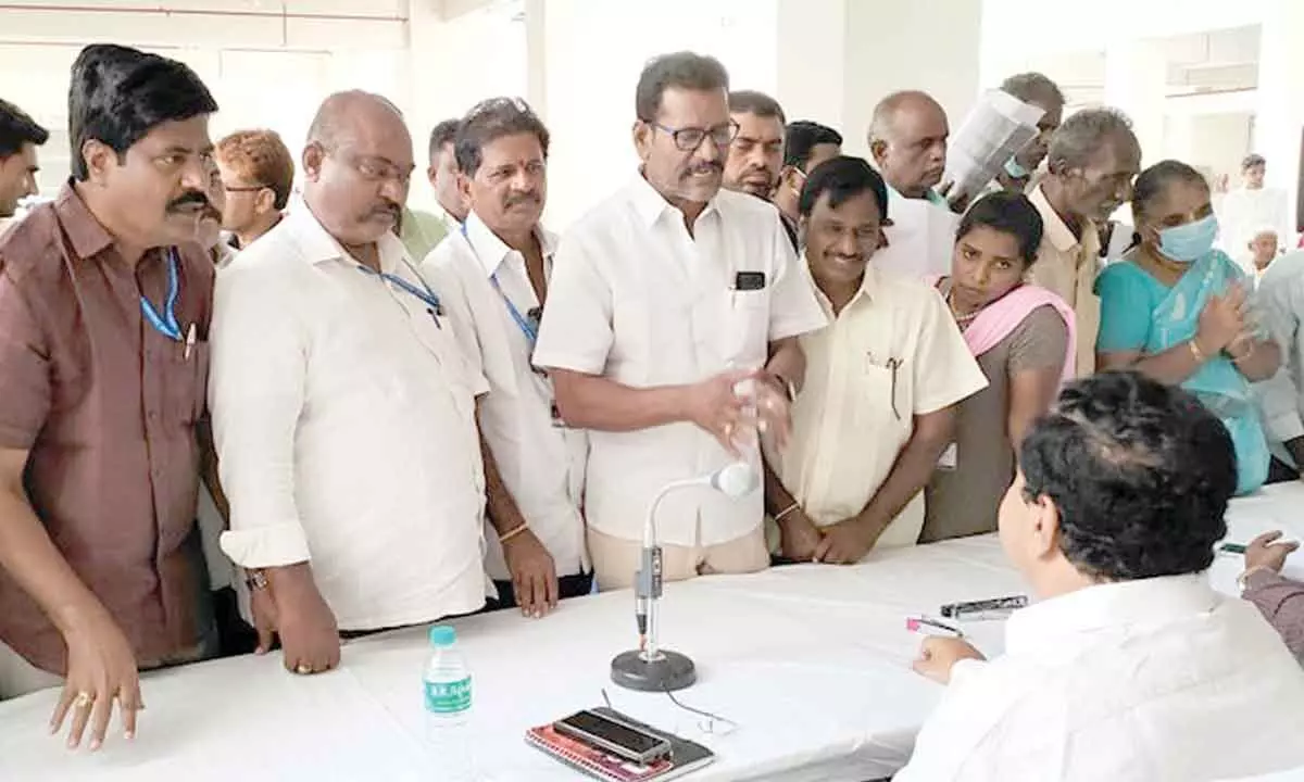 TTD Employees Union JAC leaders submitting a memorandum to District Collector  Venkataraman Reddy at his office in Tirupati on Monday