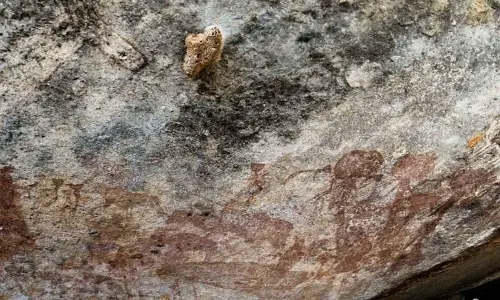 Unsettling Giant-Headed Figures Discovered Painted In Tanzanian Rock Shelter