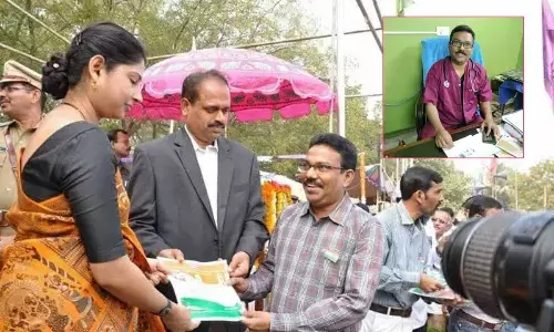 File picture of Dr Penchalaiah receiving best doctor award from IAS officer Smita Sabharwal