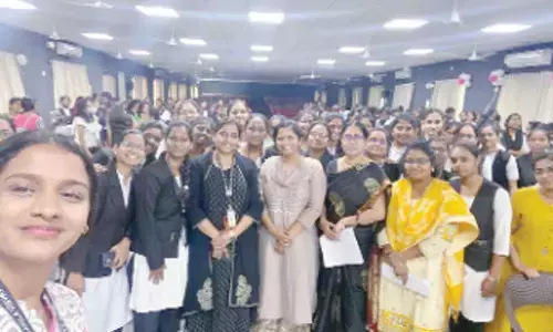 Associate Attorney in USA Neelima Pothireddy along with SPMVV International Relations Dean Prof P Vijaya Lakshmi, Dr Madhuri Paradesi and students of Law department in Tirupati on Tuesday