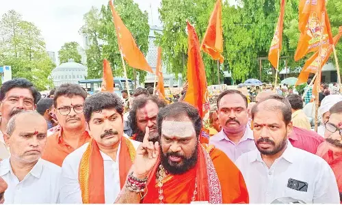 Saiva Kshetram seer Siva Swamy speaking  at a rally in Guntur  on Tuesday