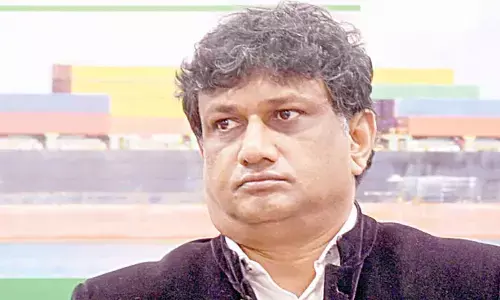 Bengaluru ex-deputy commissioner shares common barrack with criminals