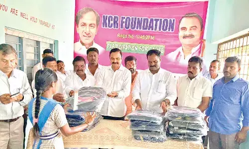 KCR Foundation distributes study material to students